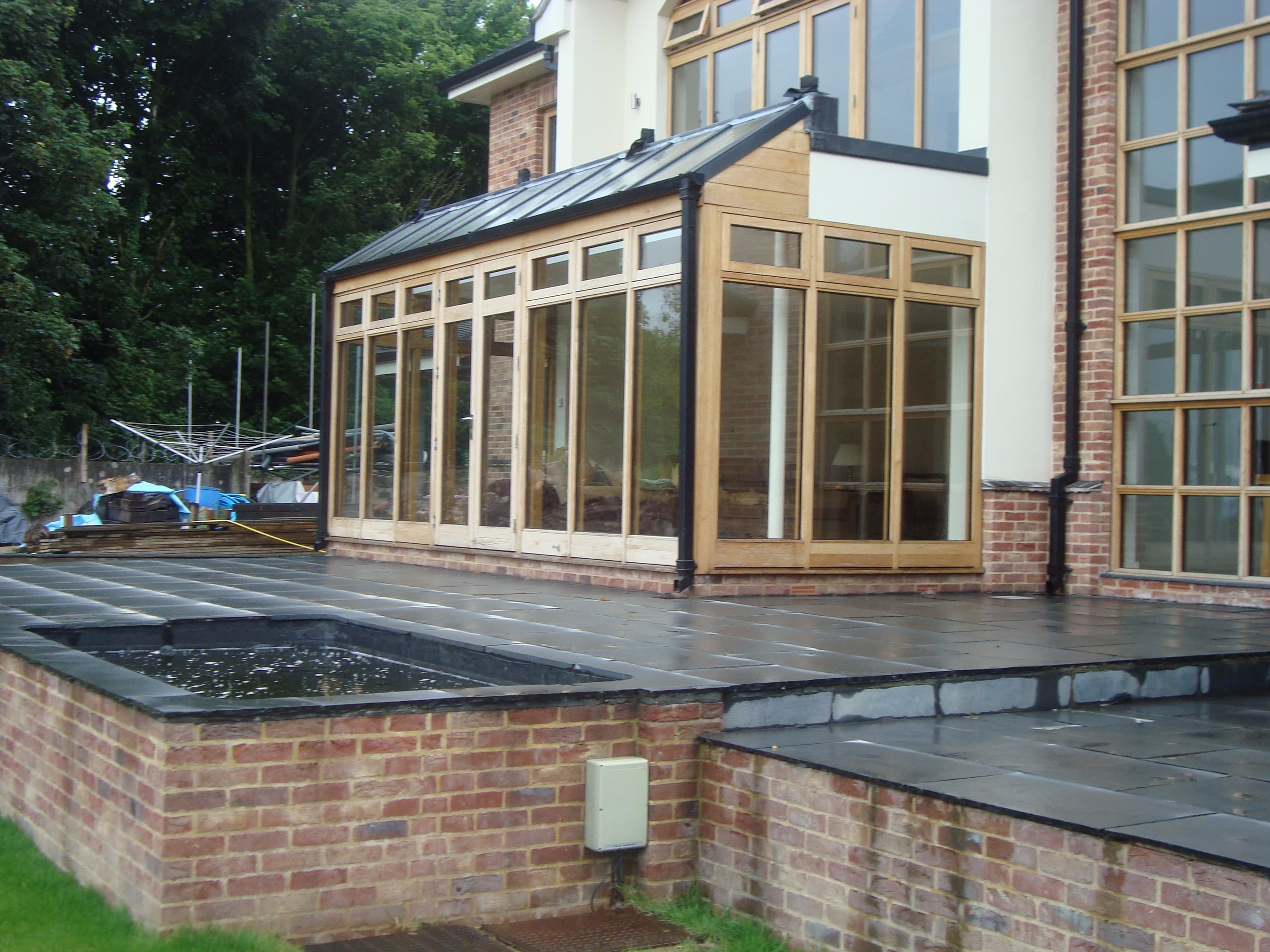 Glazed oak garden room extension with a feature roof lantern