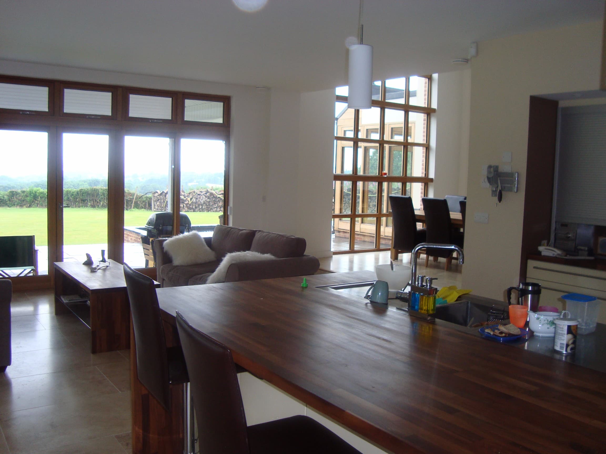 Open-plan kitchen and living space with countryside views